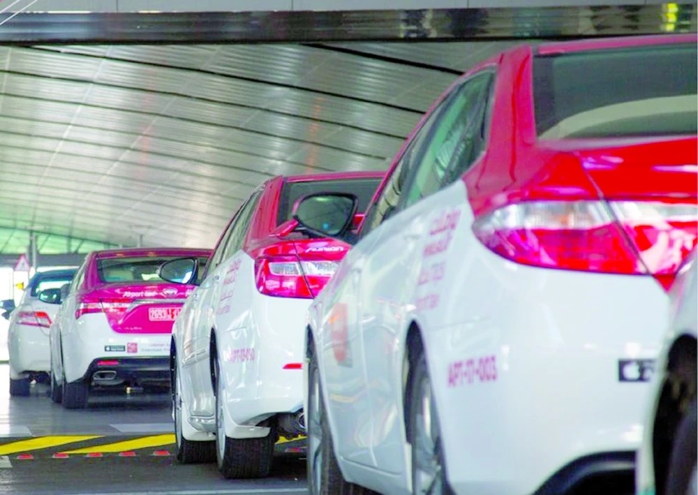 airport taxis urged to register with companies