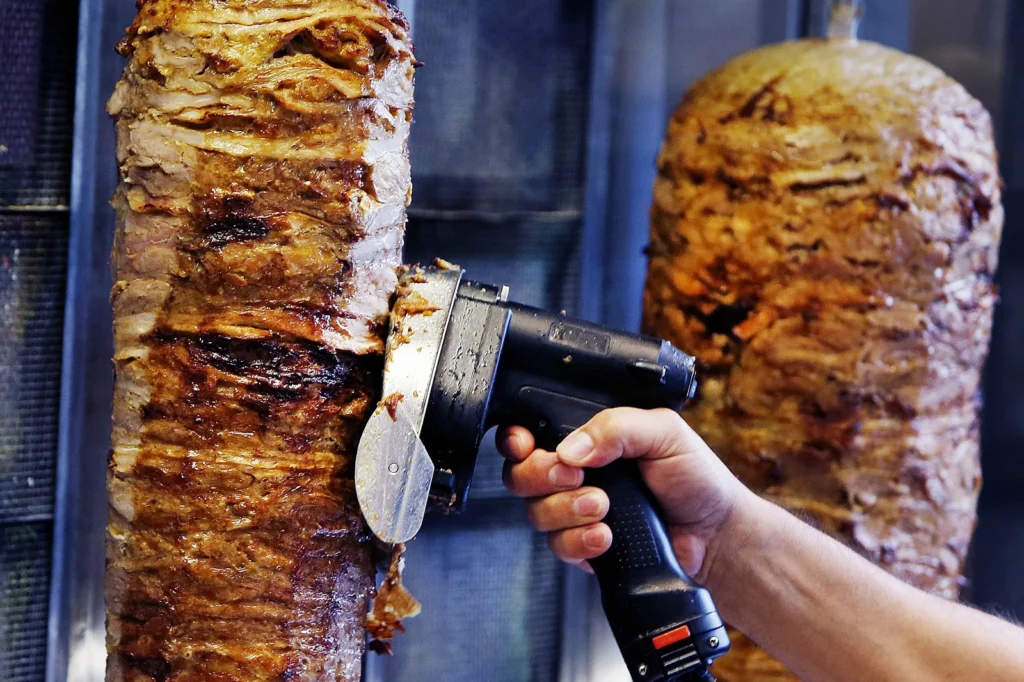 Muscat Municipality Bans Manual Knives for Shawarma, Mandates Electric Alternatives